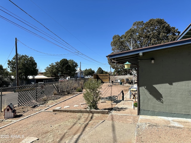 view of yard featuring fence