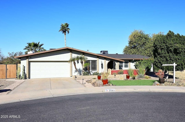 single story home with a garage