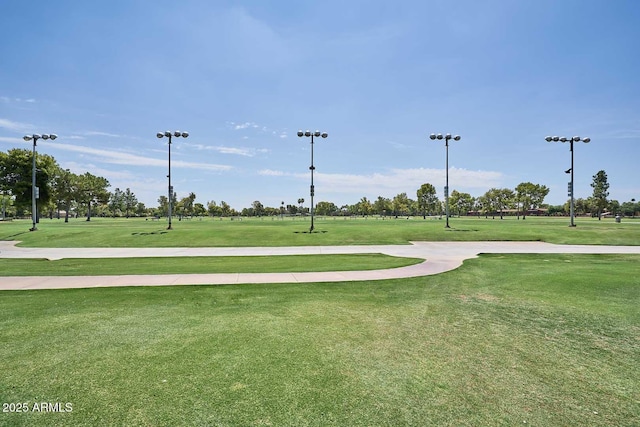 view of home's community featuring a lawn