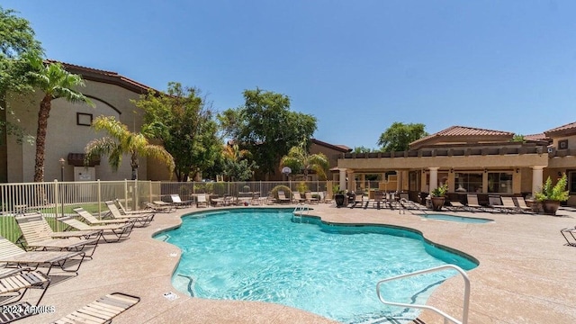 view of pool featuring a patio area