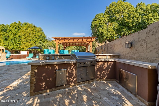 view of patio / terrace with a fenced in pool, an outdoor kitchen, a pergola, and area for grilling