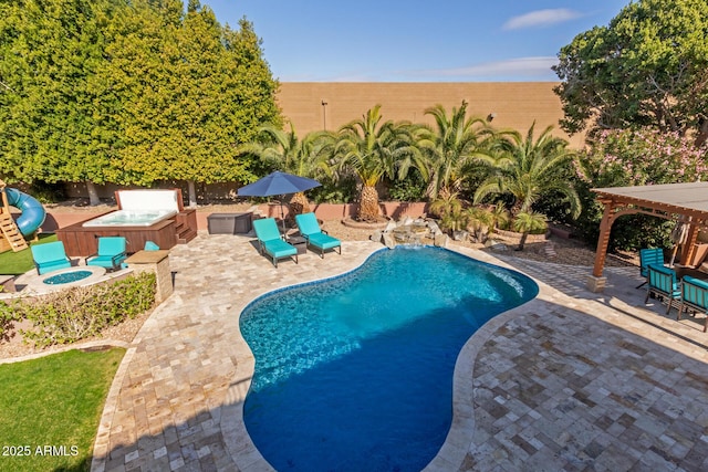 view of pool featuring a patio area