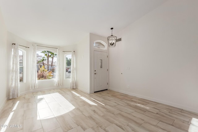 interior space with an inviting chandelier