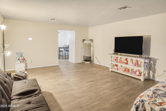 living room with hardwood / wood-style floors