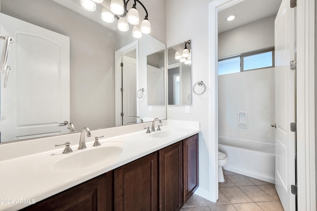 full bathroom with vanity, toilet, shower / tub combination, and tile patterned floors