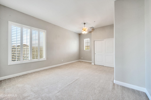 view of carpeted spare room