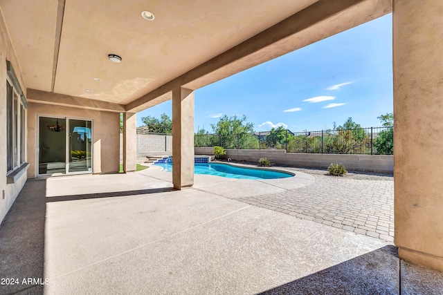 view of pool featuring a patio area