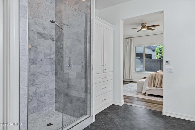 3038 E Longhorn Dr, Gilbert, AZ 85297 - bathroom featuring a stall shower, connected bathroom, ceiling fan, and baseboards