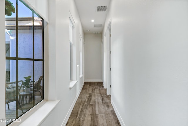 3038 E Longhorn Dr, Gilbert, AZ 85297 - hallway featuring wood finished floors, baseboards, and recessed lighting