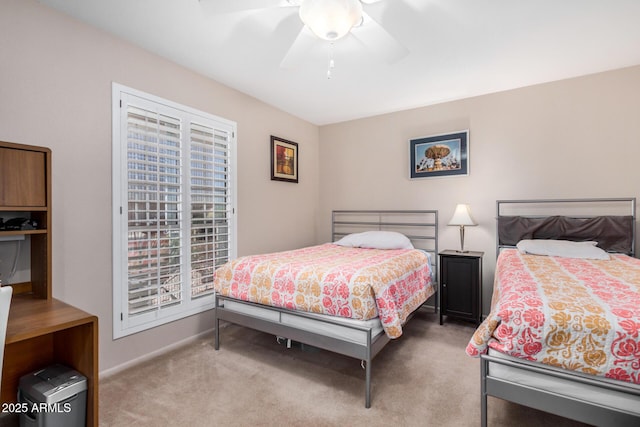 bedroom featuring carpet and ceiling fan