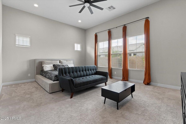 bedroom with light colored carpet and ceiling fan