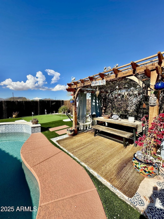 exterior space featuring a pool and a pergola