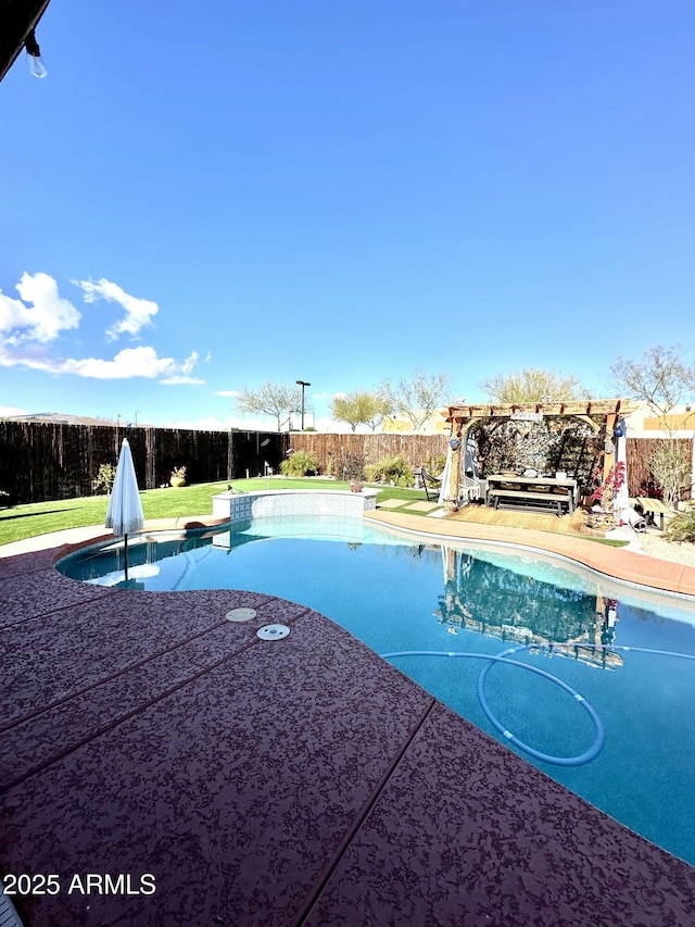 view of pool featuring a patio