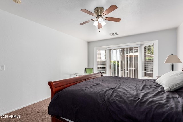 bedroom featuring ceiling fan and carpet floors