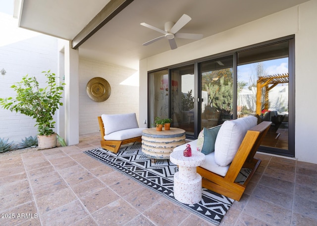 view of patio featuring a ceiling fan