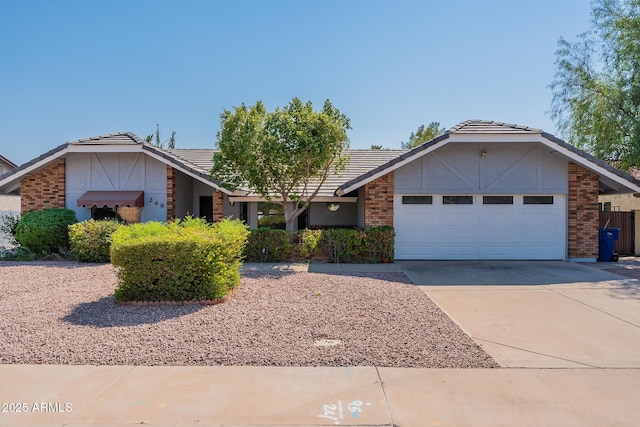 single story home featuring a garage