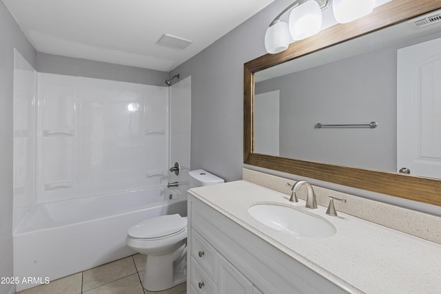 full bathroom featuring tile patterned floors, toilet, tub / shower combination, and vanity