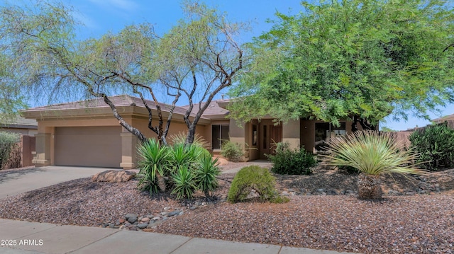 42122 N Anthem Springs Rd, Anthem, AZ 85086 - view of front of home featuring an attached garage, stucco siding, and driveway