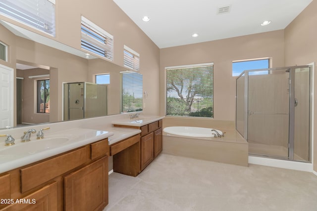 42122 N Anthem Springs Rd, Anthem, AZ 85086 - bathroom with a shower stall, vanity, a bath, and recessed lighting