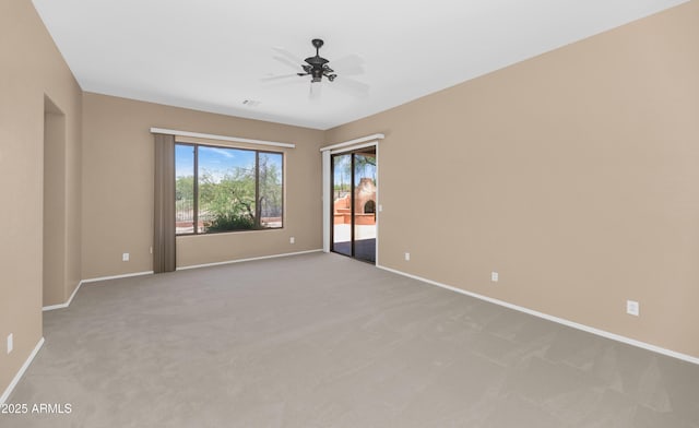 42122 N Anthem Springs Rd, Anthem, AZ 85086 - spare room with light colored carpet and a ceiling fan