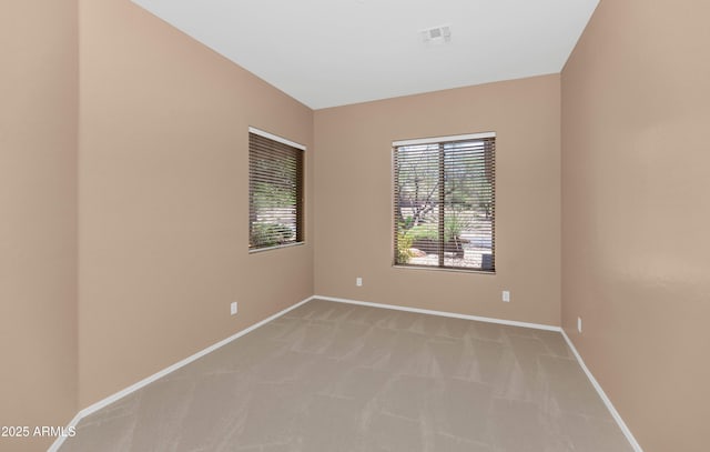42122 N Anthem Springs Rd, Anthem, AZ 85086 - spare room with light colored carpet and baseboards