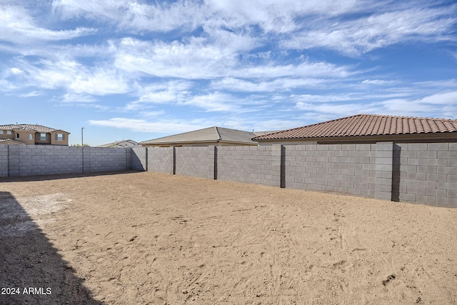 view of yard with a fenced backyard