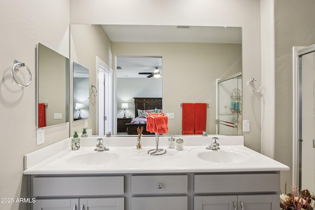 5724 N 108th Ave, Phoenix, AZ 85037 - full bath with ensuite bath, double vanity, a shower stall, and a ceiling fan
