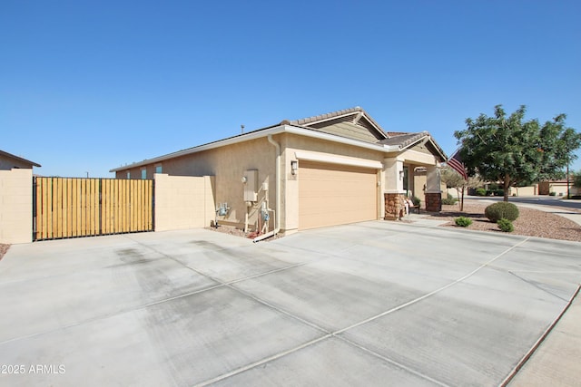 5724 N 108th Ave, Phoenix, AZ 85037 - view of front of property with stucco siding, concrete driveway, a garage, and a tile roof