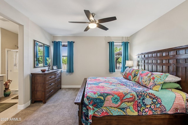 5724 N 108th Ave, Phoenix, AZ 85037 - bedroom featuring light carpet and a ceiling fan