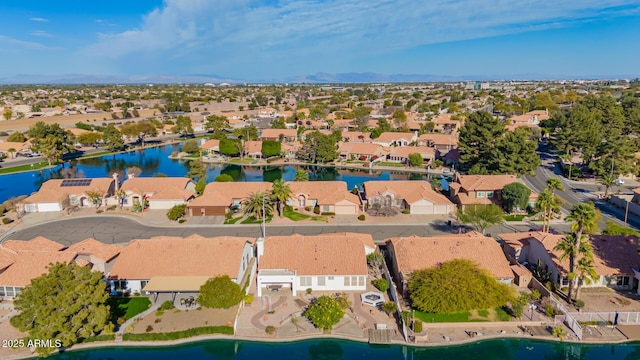 aerial view with a water view and a residential view