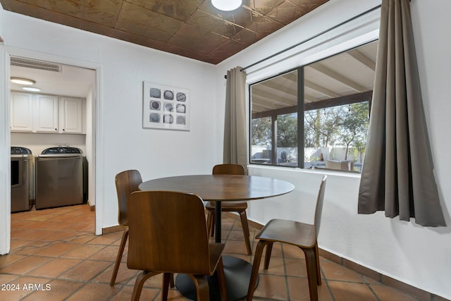 dining room featuring washing machine and dryer