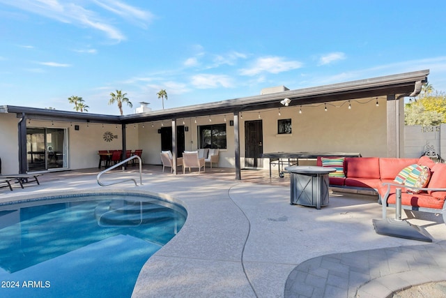 view of swimming pool featuring an outdoor hangout area and a patio area