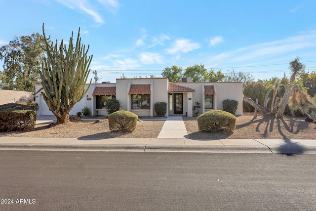 view of pueblo revival-style home