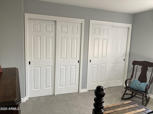 living area featuring carpet flooring