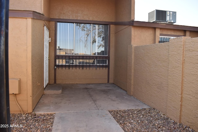 property entrance with central air condition unit