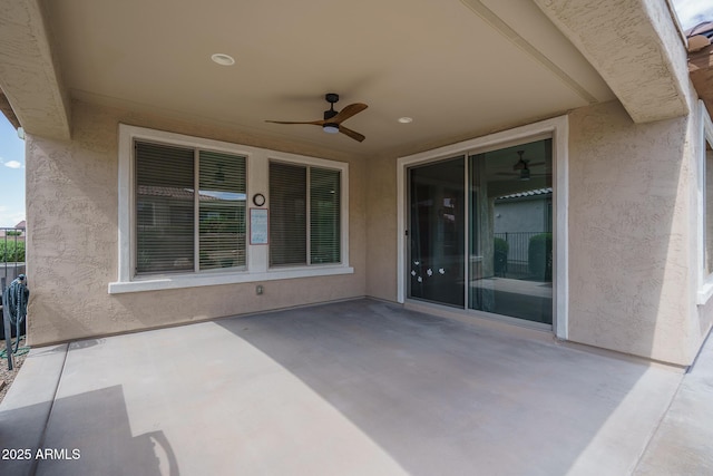 view of patio with ceiling fan