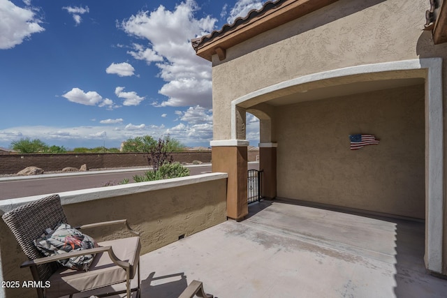 view of patio / terrace featuring a balcony