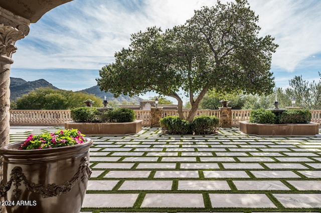 view of patio with a mountain view