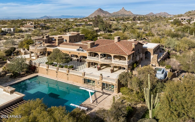 aerial view featuring a mountain view