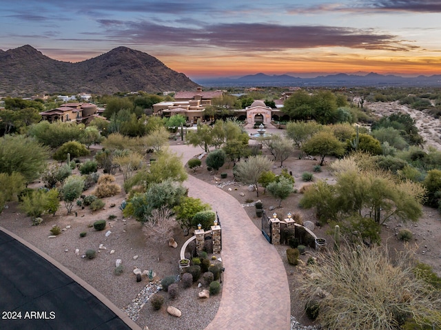 aerial view at dusk with a mountain view