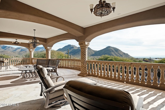 view of patio / terrace featuring a mountain view