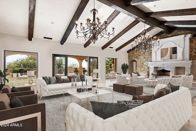 living room featuring high vaulted ceiling, beam ceiling, a notable chandelier, and a premium fireplace