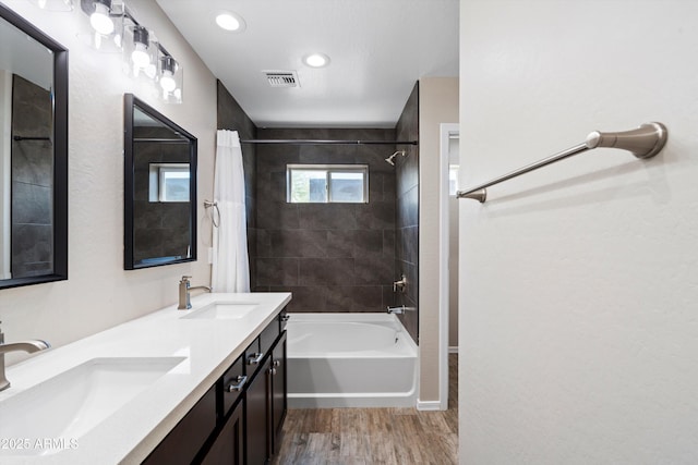 3010 N 37th St Unit 6, Phoenix, AZ 85018 - bathroom featuring wood finished floors, shower / tub combo, double vanity, recessed lighting, and baseboards