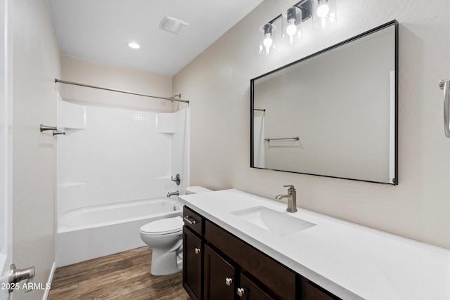 3010 N 37th St Unit 6, Phoenix, AZ 85018 - full bath with toilet, wood finished floors, vanity, and shower / tub combination
