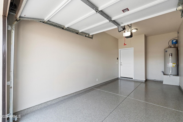 3010 N 37th St Unit 6, Phoenix, AZ 85018 - garage with electric water heater, a garage door opener, and baseboards