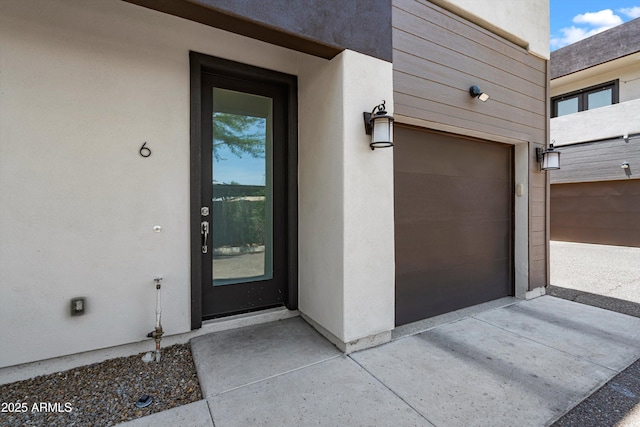 3010 N 37th St Unit 6, Phoenix, AZ 85018 - property entrance featuring stucco siding and a garage