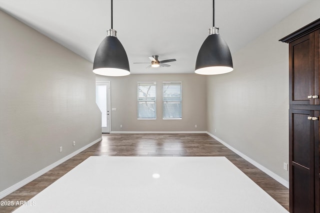 3010 N 37th St Unit 6, Phoenix, AZ 85018 - spare room featuring a ceiling fan, dark wood finished floors, and baseboards
