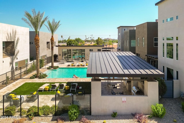 view of swimming pool with a gazebo and a patio area