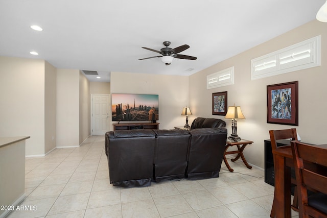 living room with light tile patterned floors and ceiling fan