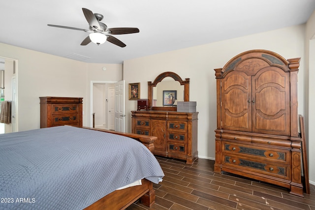 bedroom featuring dark wood-type flooring and ceiling fan